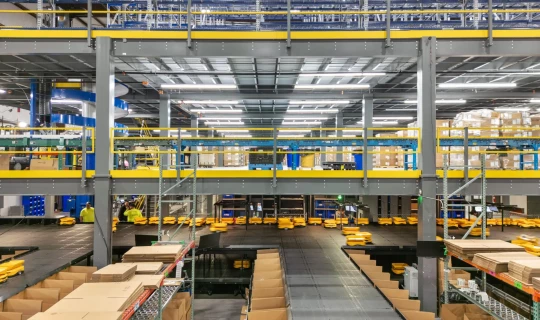 How to Integrate Conveyor Support Structures with Multi-Level Mezzanine Systems